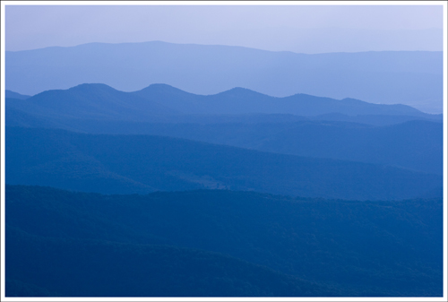 This nice view of the layered mountains comes near the end of the hike. This view is much more impressive than the waterfall this trail is named for.