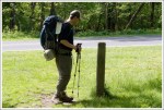 Consulting a Trail Marker Consulting a Trail Marker